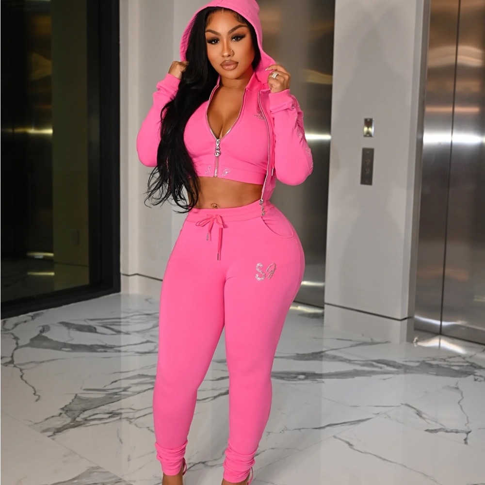 Pink track suit